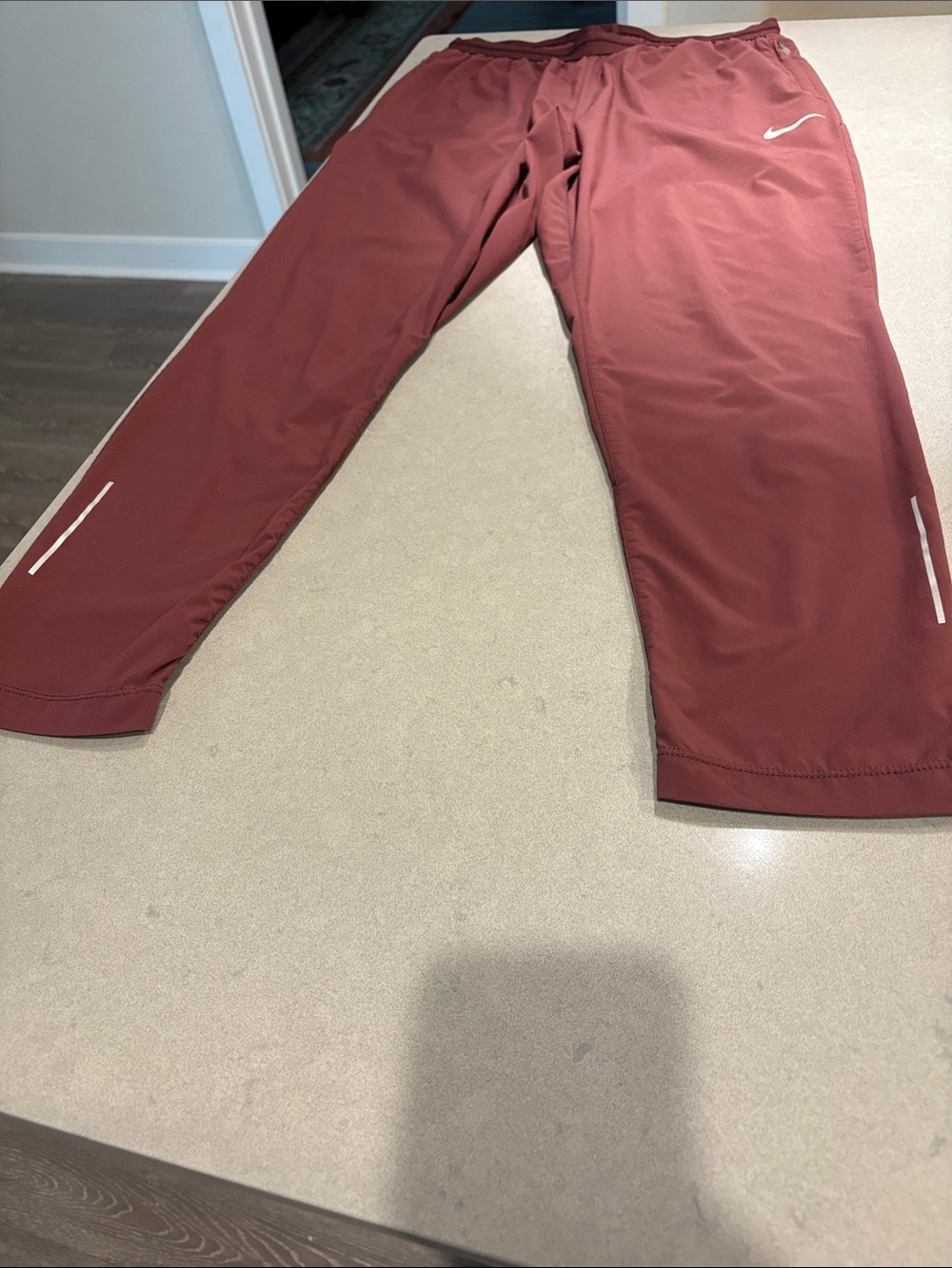 Nike Burgundy Women's Track Joggers with Reflective Accents